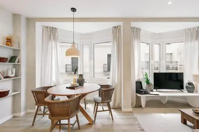 a bedroom with a large bed with two night stands at Conca - 2 bedrooms apartment in Sant Gervasi in Barcelona