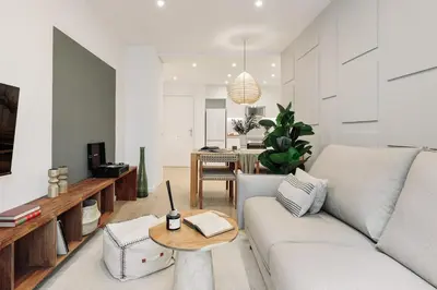a bathroom with a shower and a toilet and a sink at Cava - 2 bedrooms and terrace in Ciutat Vella in Barcelona