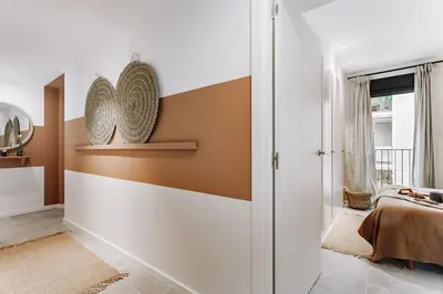 a living room with a couch and a table at Cadiar - 2 bedrooms in Eixample Esquerra in Barcelona