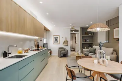 a living room with a couch and a table at Monterrico - 2 bedrooms and terrace in Gràcia in Barcelona