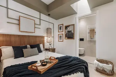 a kitchen and living room with a table and chairs at Monterrico - 2 bedrooms and terrace in Gràcia in Barcelona