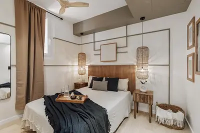 a living room with a couch and a table at Monterrico - 2 bedrooms and terrace in Gràcia in Barcelona