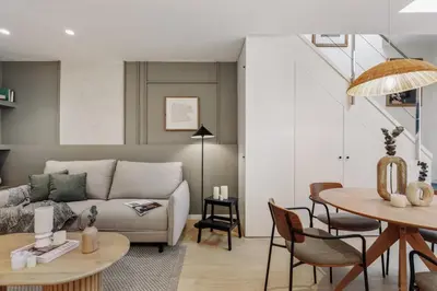 a bedroom with a bed with a table on it at Monterrico - 2 bedrooms and terrace in Gràcia in Barcelona