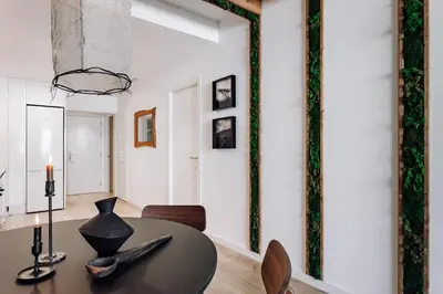 a living room with a couch and a table at Lescun - 2 bedrooms in Eixample Esquerra in Barcelona