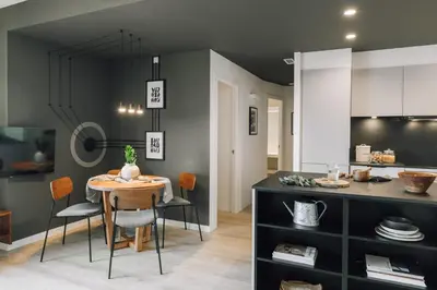 a kitchen with white cabinets and a sink at Haring - 2 bedrooms in Gràcia in Barcelona