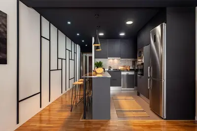 a bedroom with a large bed and a window at Mitaka - 3 bedrooms and terrace in Eixample Dreta in Barcelona