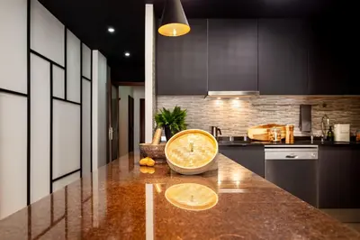 a kitchen and dining room with a table and chairs at Mitaka - 3 bedrooms and terrace in Eixample Dreta in Barcelona