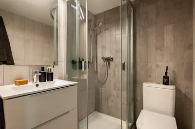 a bedroom with a bed with a basket on it at Mitaka - 3 bedrooms and terrace in Eixample Dreta in Barcelona