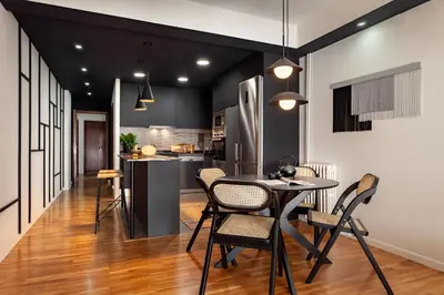 a living room with a white couch and a table at Mitaka - 3 bedrooms and terrace in Eixample Dreta in Barcelona