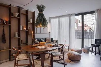 a bedroom with a bed with a tray of food on it at Pedrera - 2 bedrooms in Eixample Esquerra in Barcelona