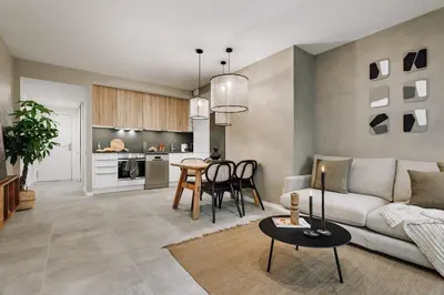 a dining room with a wooden table and chairs at Mont - 2 bedrooms and office in Eixample Esquerra in Barcelona