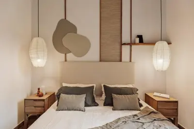 a bedroom with a large bed and a large window at Kaax - 3 bedrooms and balcony in Eixample in Barcelona