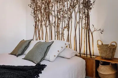 a living room with a couch and a table at Baeza - 2 bedrooms and office in Eixample Esquerra in Barcelona