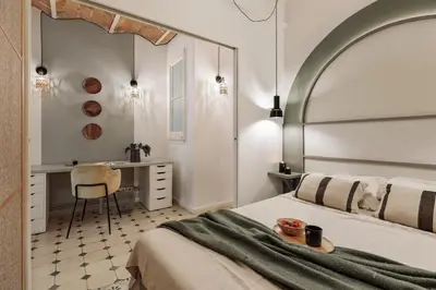 a hallway with a tile floor and white walls at Cape - 2 bedrooms in Gràcia in Barcelona