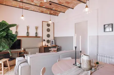 a white bathroom with a sink and a toilet at Lugros - 3 bedrooms in Gràcia in Barcelona