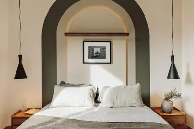 a bedroom with a bed and a large window at Potosi - 3 bedrooms and balcony in Eixample Dreta in Barcelona