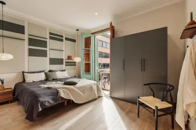 a bathroom with a shower and a sink and a mirror at Potosi - 3 bedrooms and balcony in Eixample Dreta in Barcelona