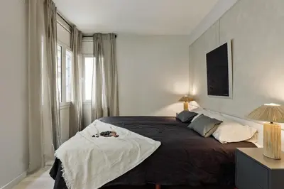 a living room with a couch and a table at Begur - 3 bedrooms and terrace in Sant Gervasi in Barcelona