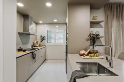 a bedroom with a bed and a desk in it at Begur - 3 bedrooms and terrace in Sant Gervasi in Barcelona