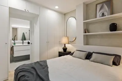 a bedroom with a large bed and a window at Begur - 3 bedrooms and terrace in Sant Gervasi in Barcelona