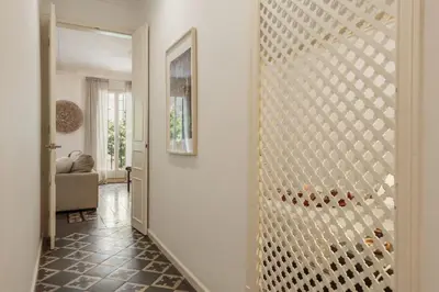 a living room with a couch and a table at Meko - 2 bedrooms and balcony in Eixample Esquerra in Barcelona