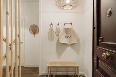 a bedroom with a bed with a tray on it at Meko - 2 bedrooms and balcony in Eixample Esquerra in Barcelona