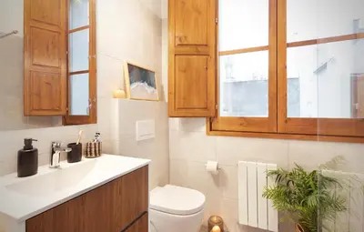 a living room with a couch and a table at Mahoro - 3 bedrooms in Ciutat Vella in Barcelona