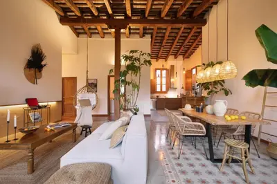 a kitchen with a counter and a refrigerator at Mahoro - 3 bedrooms in Ciutat Vella in Barcelona
