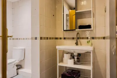 a bathroom with a sink and a toilet at Casa en Barcelona in Barcelona