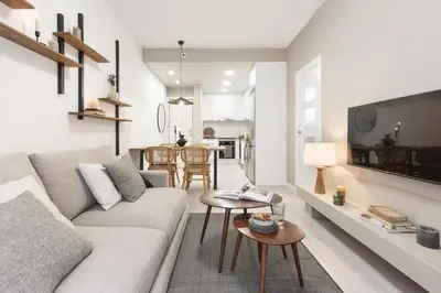 a living room with a couch and a table at Lourdes - 3 bedrooms apartment in Sant Gervasi in Barcelona
