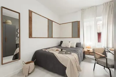 a living room with a couch and a table at Lourdes - 3 bedrooms apartment in Sant Gervasi in Barcelona