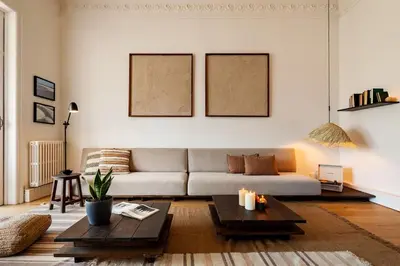 a living room with a couch and a table at Atins - 2 bedrooms in Eixample Dreta in Barcelona