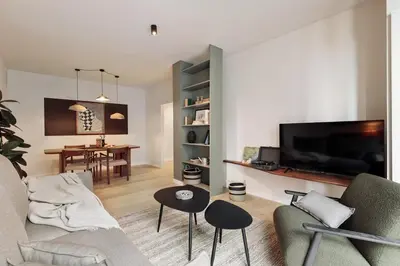 a white kitchen with a sink and a counter at Garraf - 2 bedrooms and balcony in Sant Gervasi in Barcelona