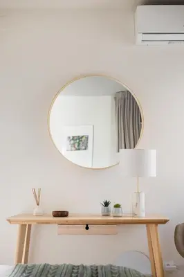 a bedroom with a large white bed with pillows at Acogedor Apartamento Centro , Cerca de Plaza España y Barcelona in Hospitalet de Llobregat