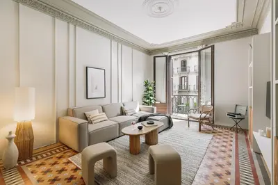 a bedroom with a large bed and a large window at Albori - 2 bedrooms and balcony in Eixample Dreta in Barcelona