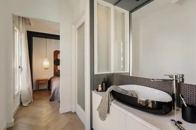 a bedroom with a desk and a mirror at Fener - 3 bedrooms in La Dreta de l'Eixample in Barcelona