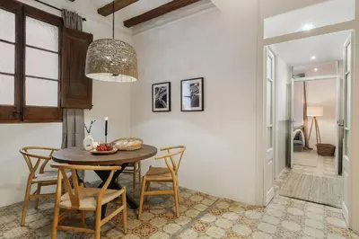 a living room with a couch and a tv at Pano - 2 bedrooms in St Pere Sta Caterina i Ribera in Barcelona