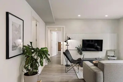 a kitchen with a sink and a refrigerator at Falco - 2 bedrooms with shared pool in Les Corts in Barcelona