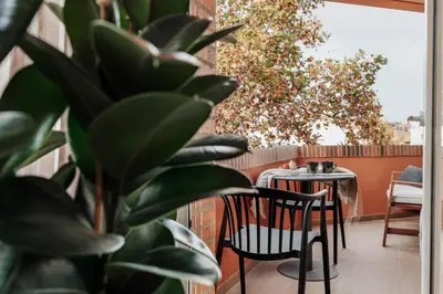 a bedroom with a large bed and a window at Gumus - 3 bedrooms and office in Les Tres Torres in Barcelona