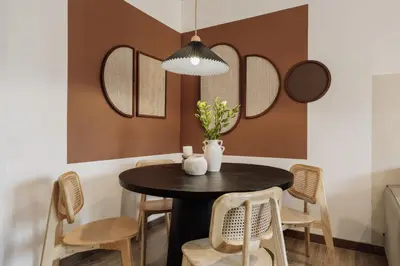 a living room with a couch and a table at Gumus - 3 bedrooms and office in Les Tres Torres in Barcelona