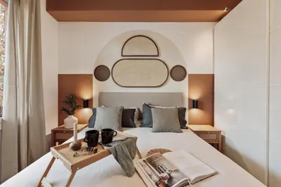 a room with a desk with a computer and a chair at Gumus - 3 bedrooms and office in Les Tres Torres in Barcelona