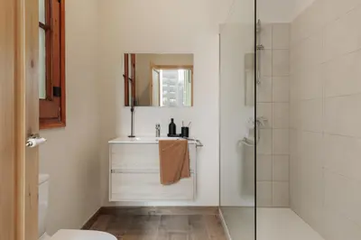 a bedroom with a bed and a desk in a room at Amatitlan - 3 bedrooms and balcony in Eixample in Barcelona