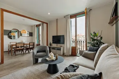 a bedroom with a bed with a table on it at Amatitlan - 3 bedrooms and balcony in Eixample in Barcelona