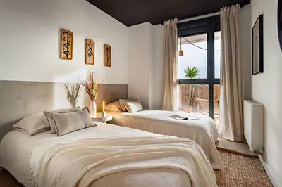 a bathroom with a toilet and a sink and a shower at Asrir - 2 bedroom, terrace and pool in Poblenou in Barcelona