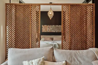 a living room with a couch and a table at Wabi - 2 bedrooms and terrace in Passeig de Gràcia in Barcelona