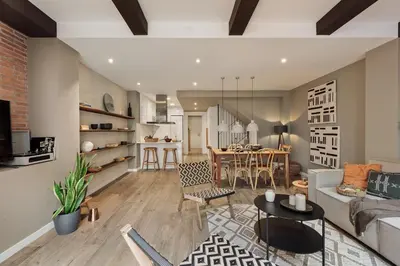 a living room with a couch and chairs at Chalby - 4 bedrooms in Eixample Esquerra in Barcelona