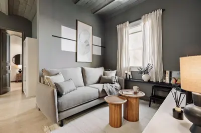 a white bathroom with a washing machine and a toilet at Pirineu - 2 bedrooms in Sant Gervasi in Barcelona
