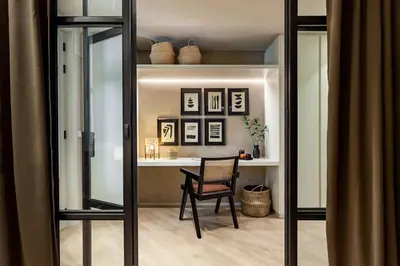 a bedroom with a bed and a mirror at Nubian - 2 bedrooms in Eixample Dreta in Barcelona