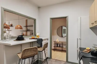 a living room with a couch and a table at Basil - 3 bedrooms and terrace in Sant Gervasi in Barcelona