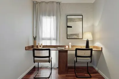 a bedroom with a bed with two lamps and a window at Fluvia - 2 bedrooms and terrace in Sant Gervasi in Barcelona